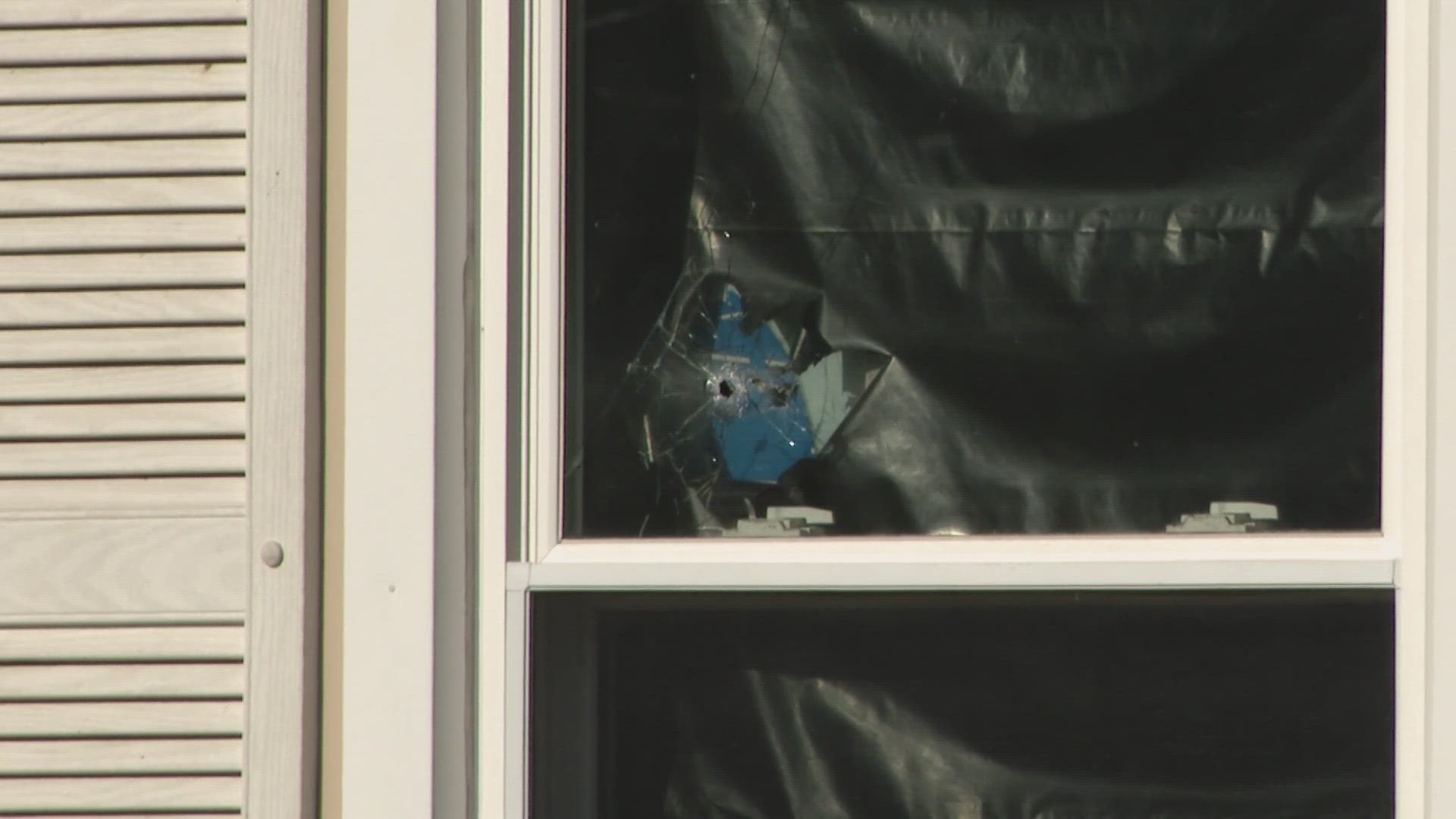 The police report states officers found a boy who'd been hit by a bullet when someone shot up the house.