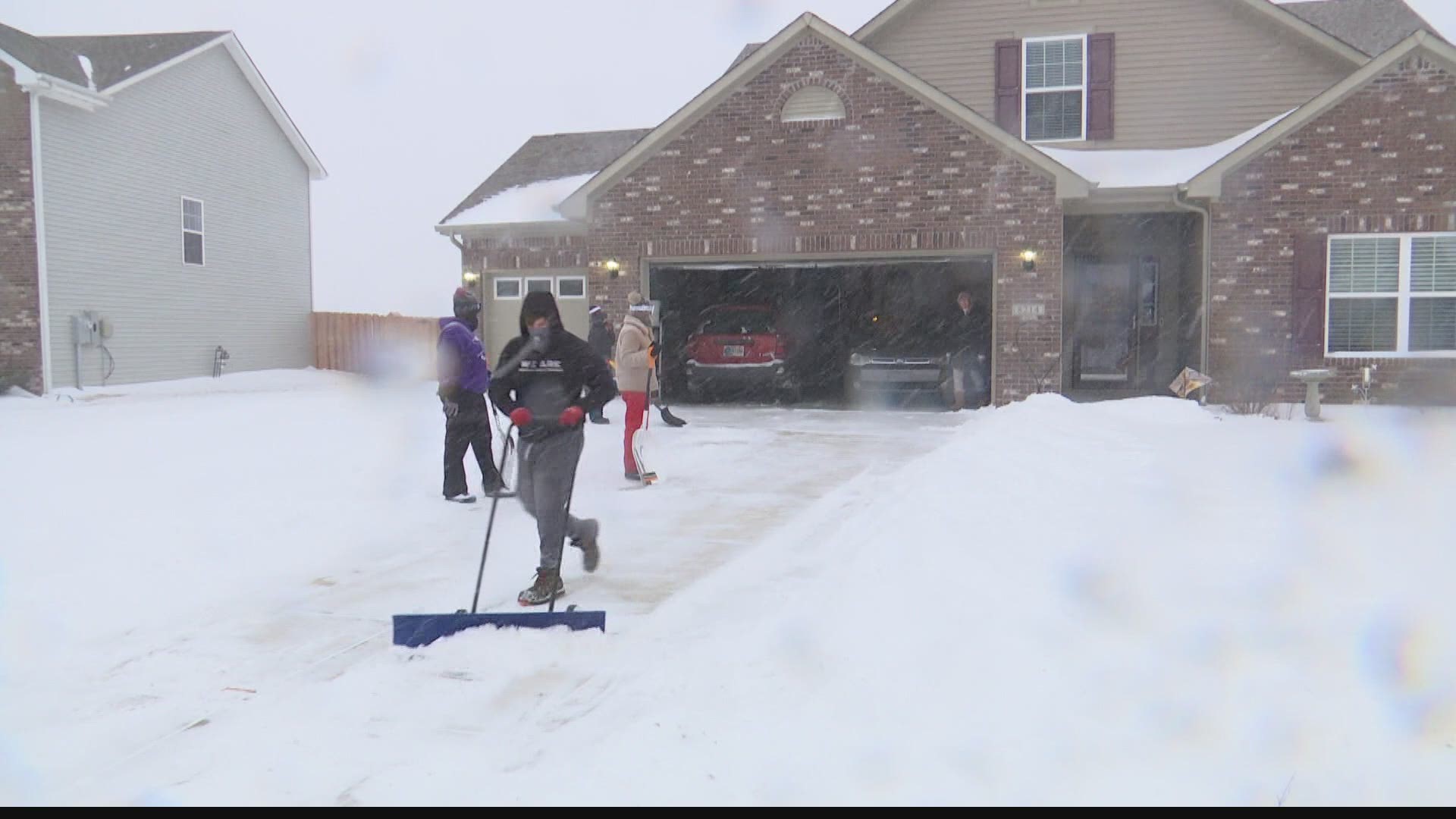 Snow shovels got an unusually vigorous workout in some neighborhoods Monday.