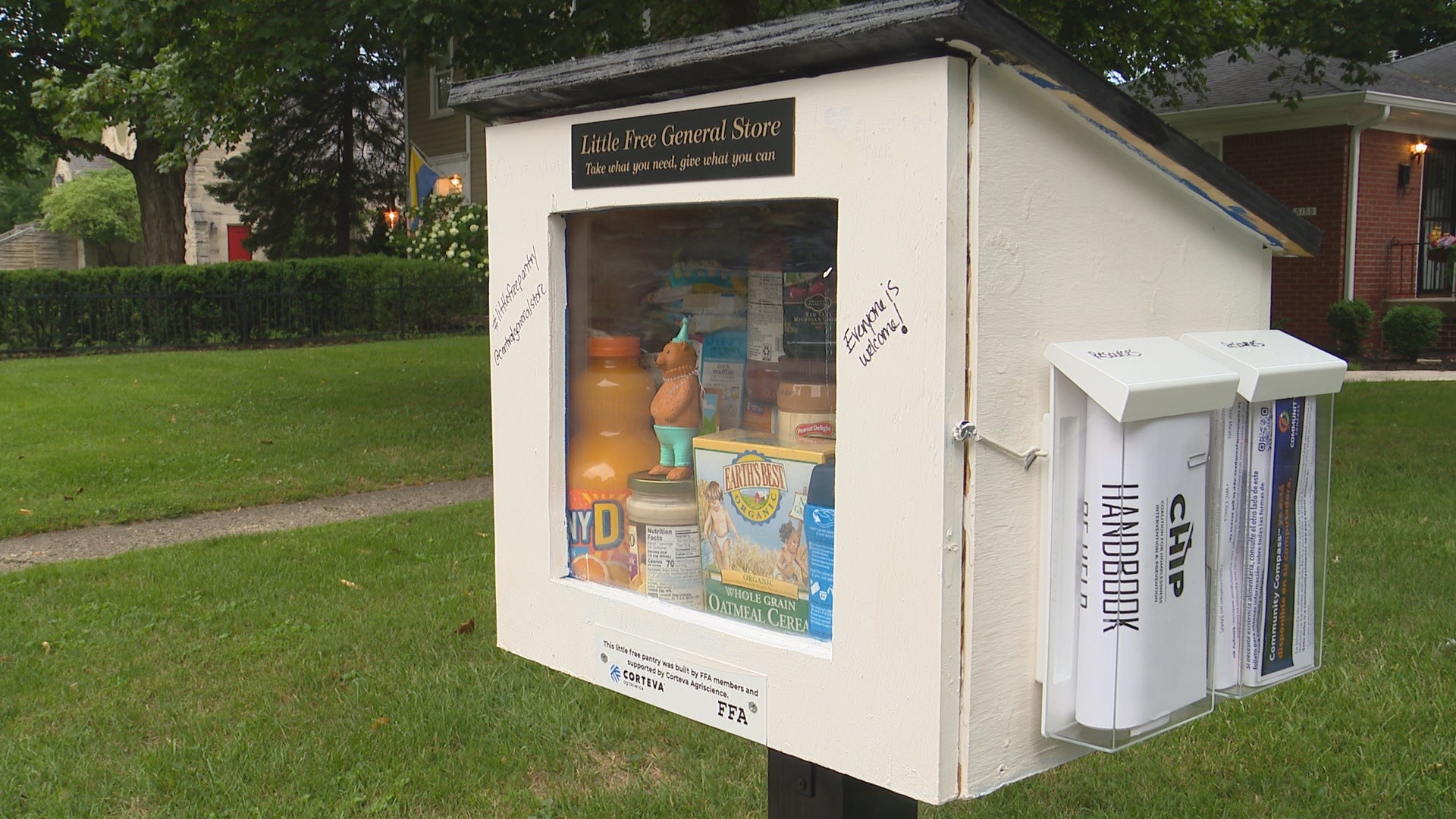 The free pantry, at Central Avenue and 52nd Street, is stocked with food, drink, toiletries and kids' toys.