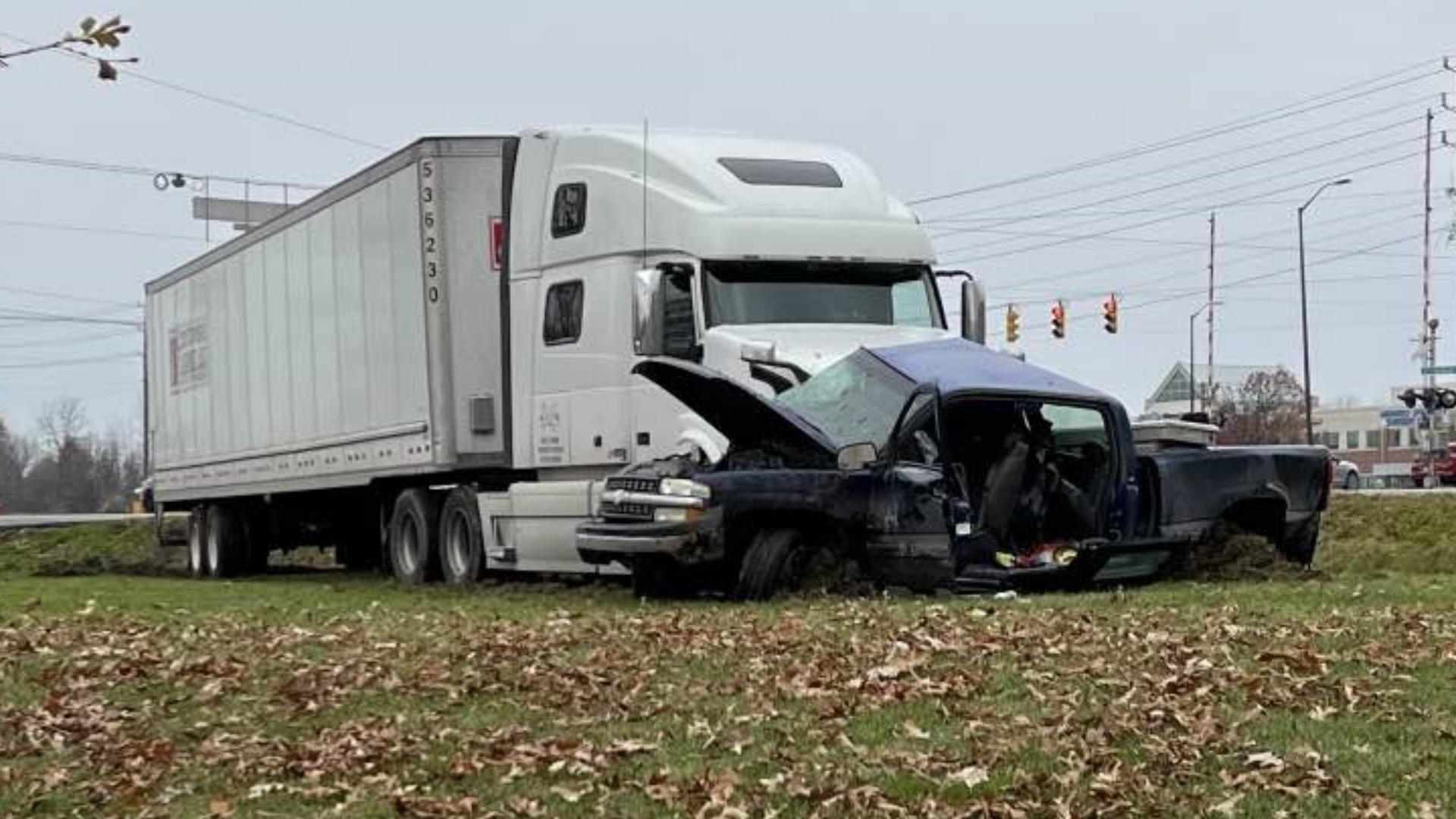 A teacher at Decatur Central High School was hospitalized in an early morning crash Monday, right outside the school.