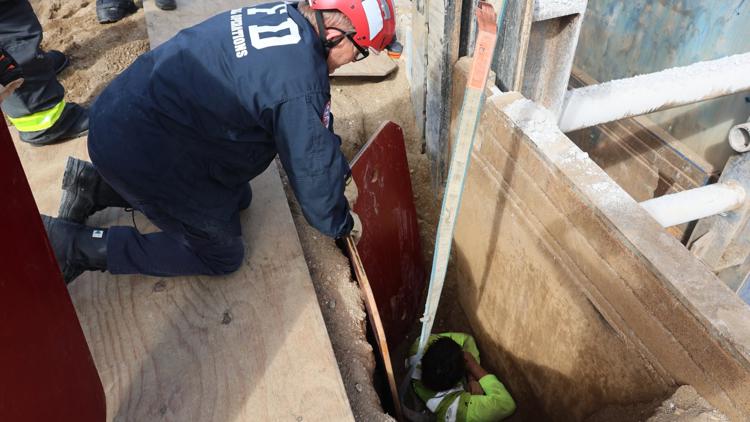 'All-hands-on deck' | Man stuck in trench for almost 3 hours before Indianapolis Fire Department rescue