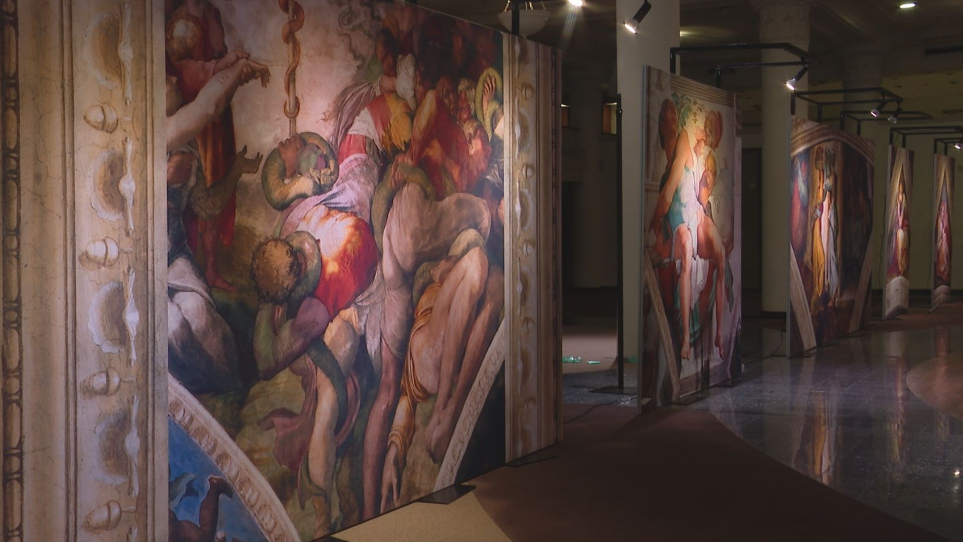 The exhibit has reproduced all 34 paintings that can be found in the Sistine Chapel and placed them at eye-level.