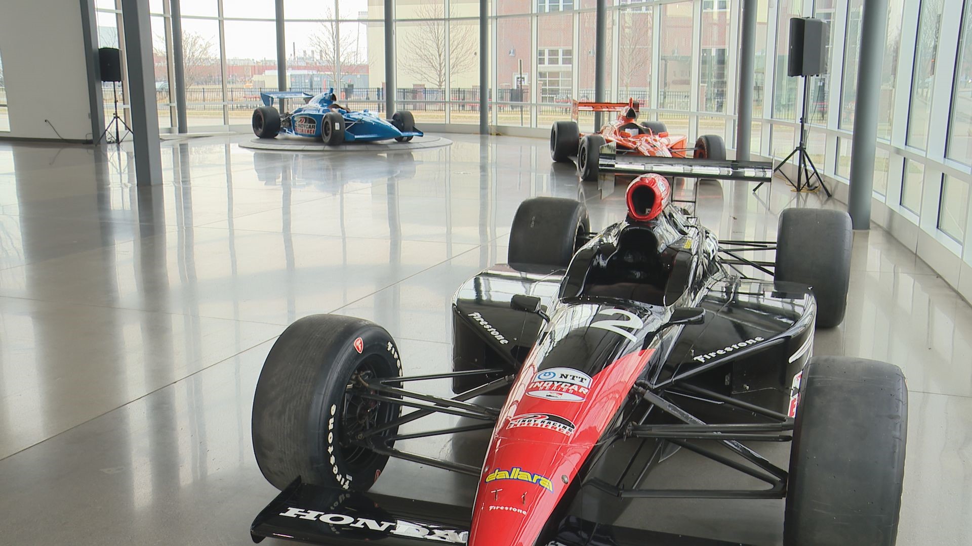 Cars driven by Indy 500 winners Dan Wheldon and Al Unser Jr. are a couple of the IndyCars for sale.