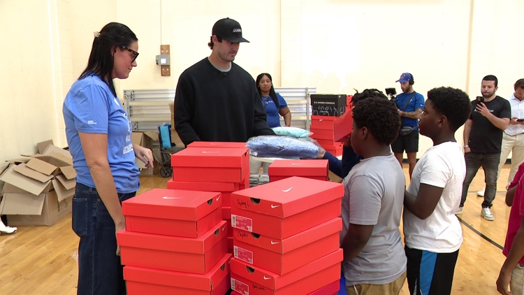 Indianapolis sports stars bring new shoes, coats to kids at Boys & Girls Clubs