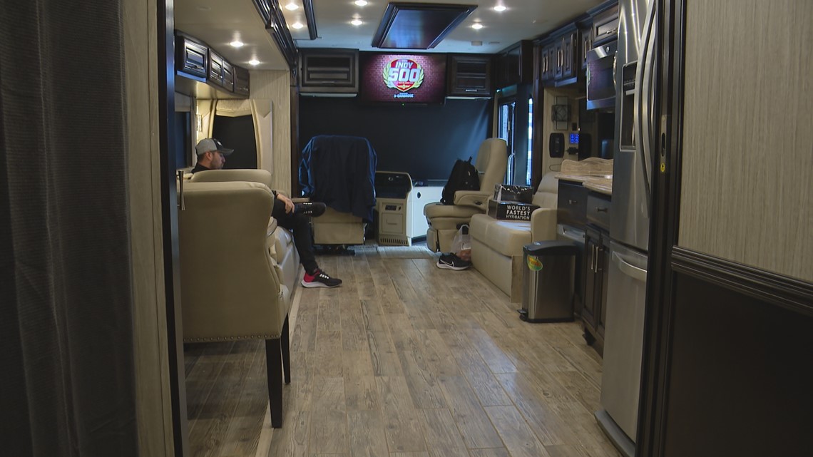 IndyCar driver Jack Harvey shows off his RV at IMS