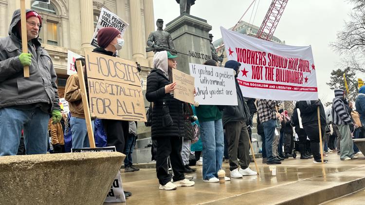 Over 100 people rally against Gov. Braun’s executive order mandating police cooperate with ICE