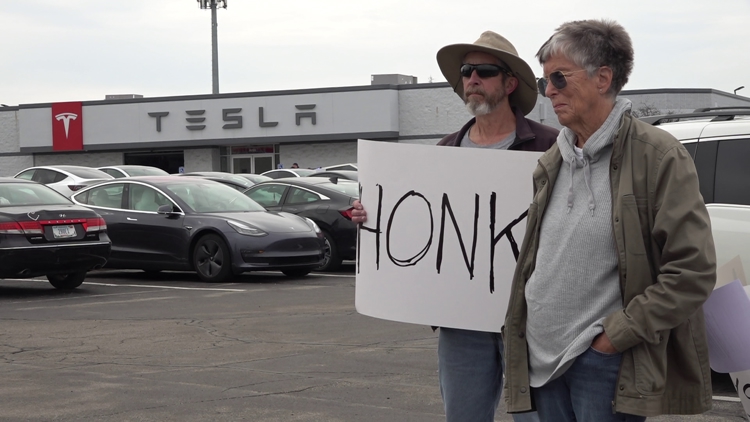 Dozens of Hoosiers join in nationwide protests against Tesla and Elon Musk