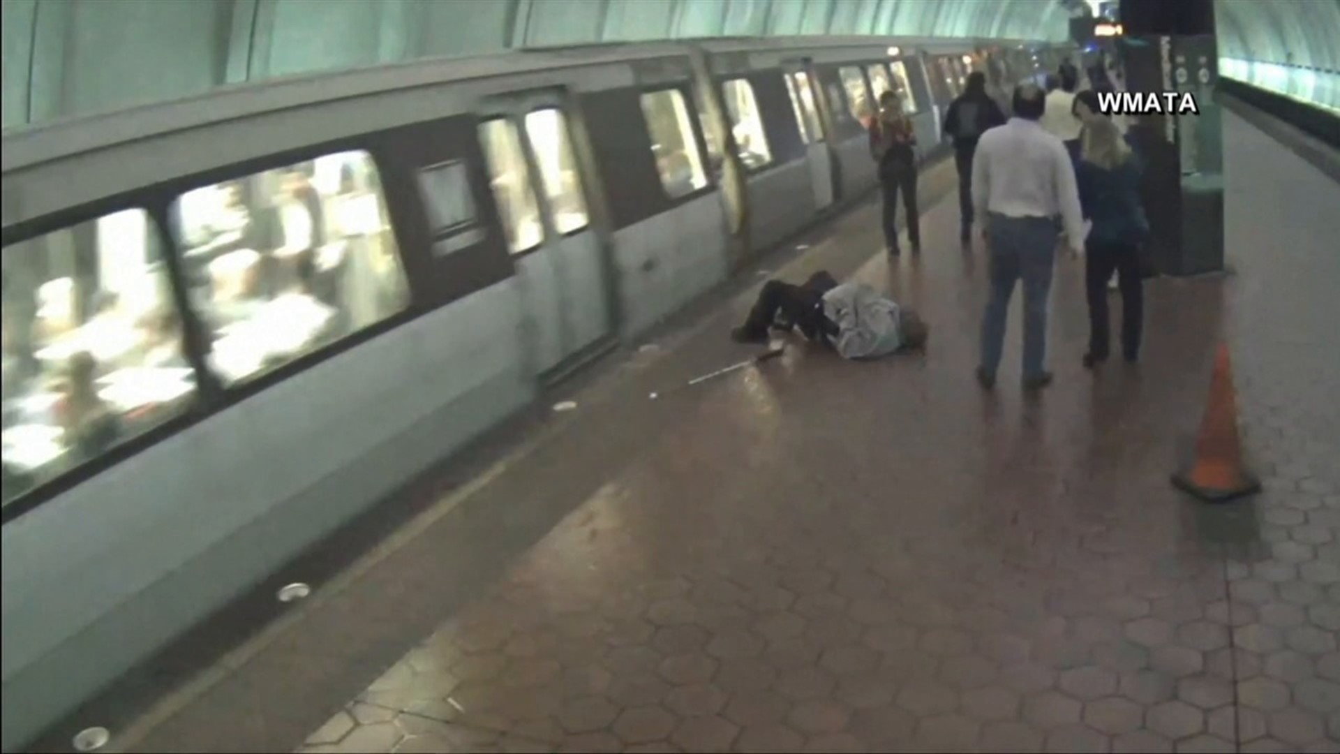 Blind man falls on subway tracks