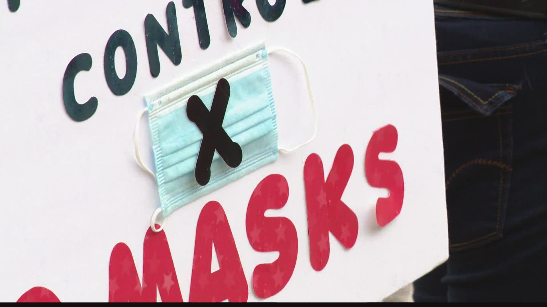 Protesters at the Statehouse Sunday were very passionate in their views about wearing face masks.