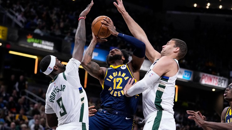 Holiday has career-high 51 points, Bucks beat Pacers 149-136