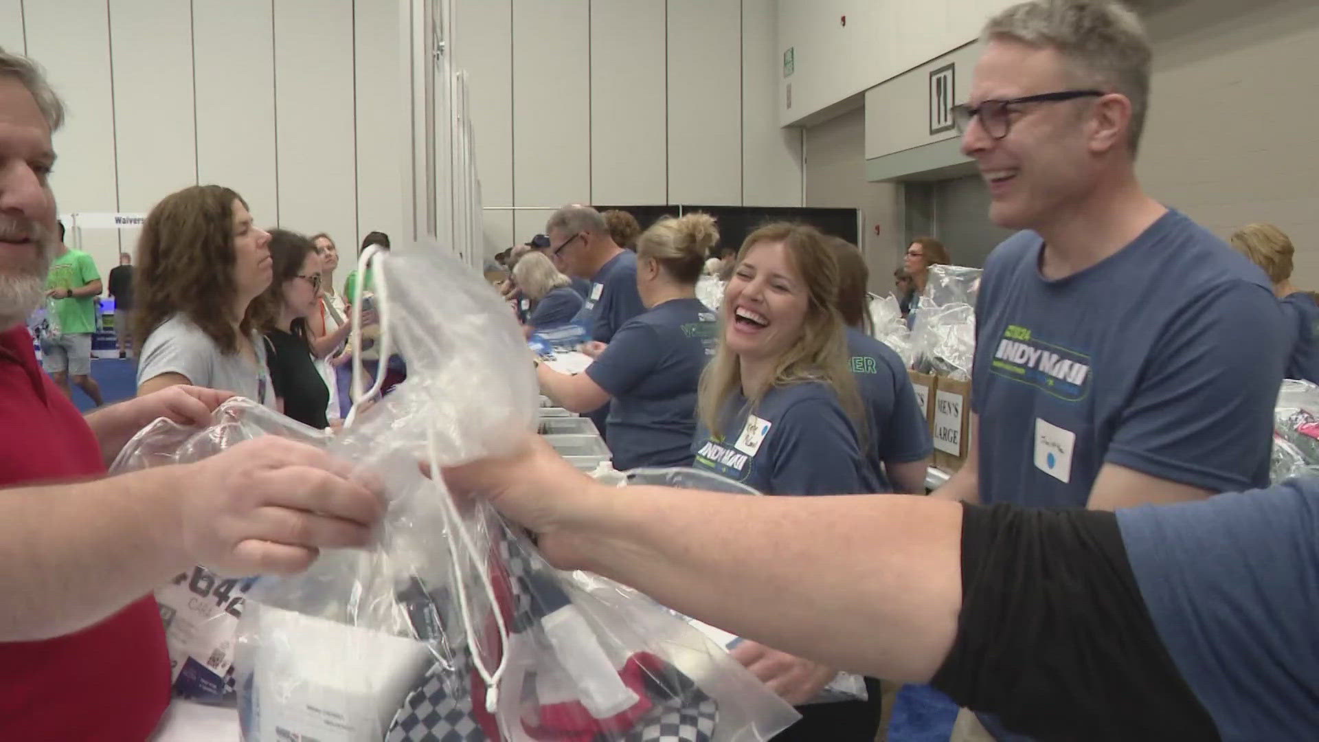Inside the 500 Festival Warehouse on East Brookside Avenue, volunteers picked up their packets with everything they needed to help with race weekend.
