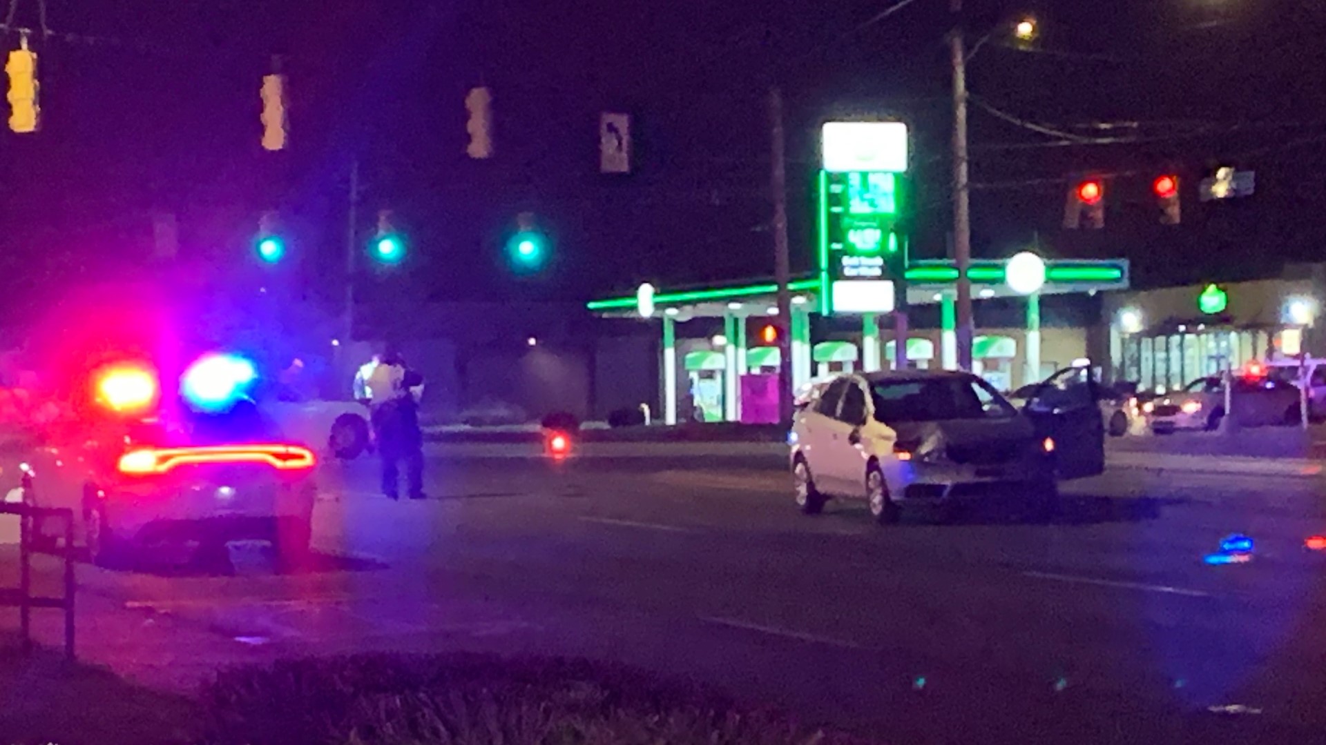 A woman was hit by a car and killed as she walked in the intersection of Churchman Avenue and Raymond Street in Indianapolis Monday morning.