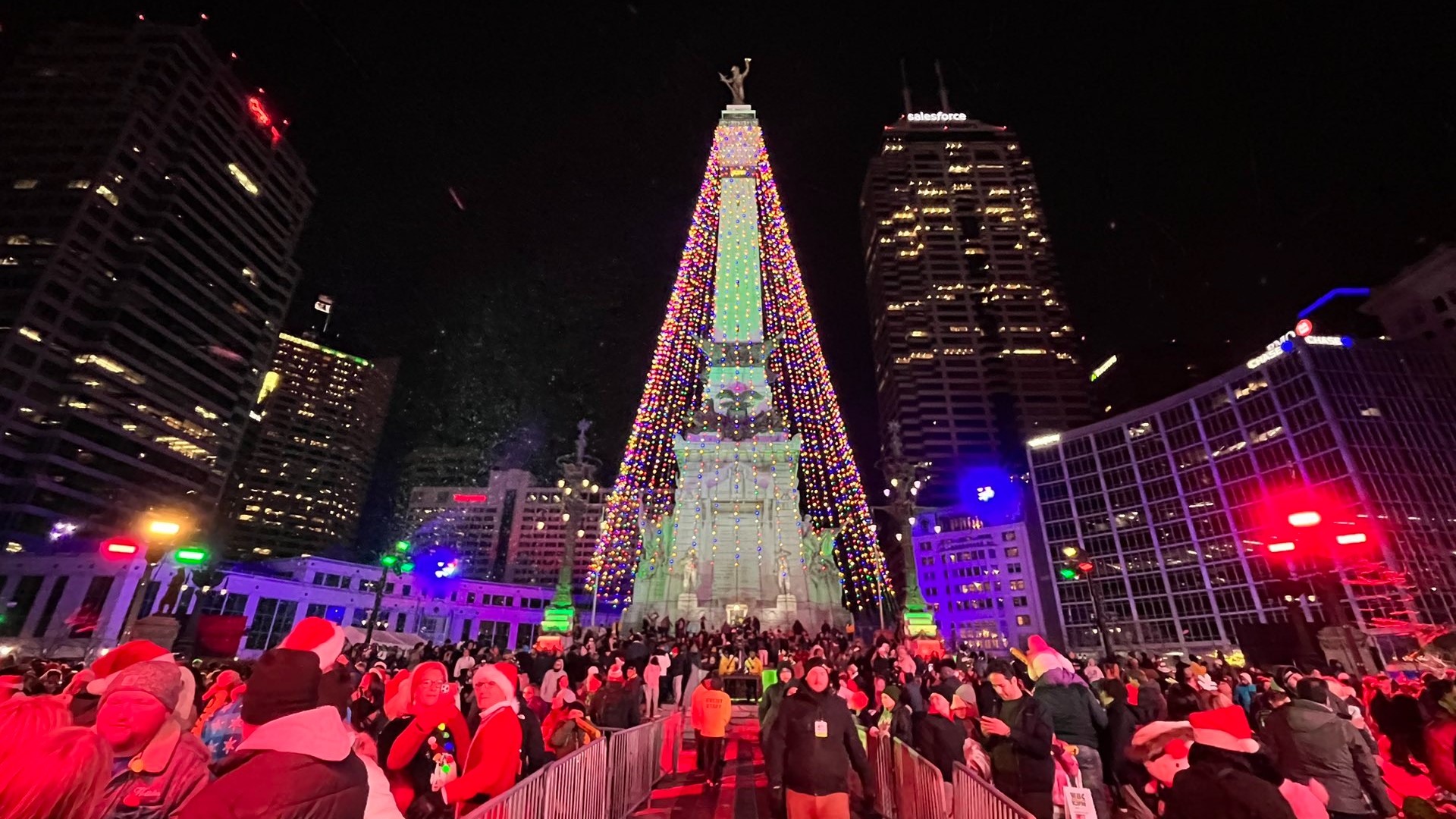 The towering Soldiers and Sailors Monument is beautifully lit as tens of thousands of people cheer on the start of the holiday season.