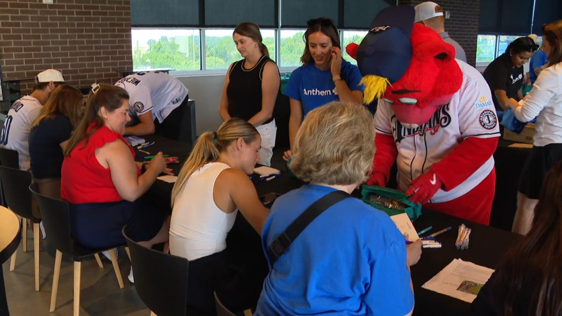 Ballplayers, volunteers pack hygiene kits for Marion County students in need | Inspiring Indiana