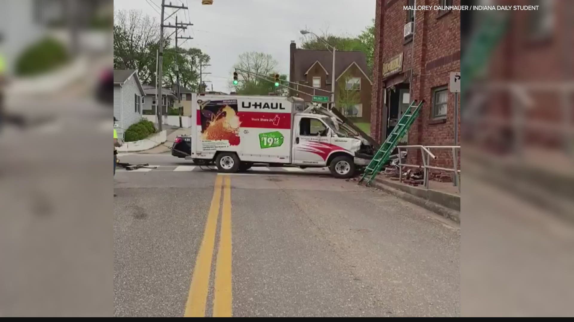 Bloomington Police believe a person driving a U-Haul fell asleep before crashing into a tattoo shop.
