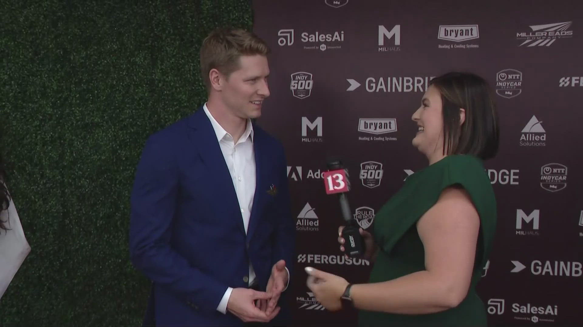 13News reporter Anna Chalker talks with Sunday's winner Josef Newgarden on the red carpet at the Indianapolis 500 Victory Celebration.