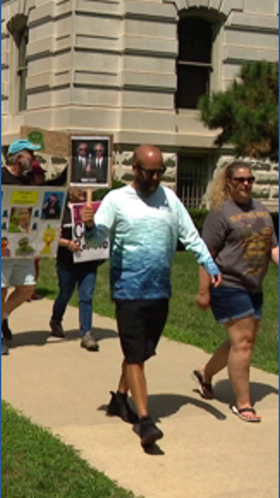 Protesters march outside Indiana Statehouse against President Trump ...