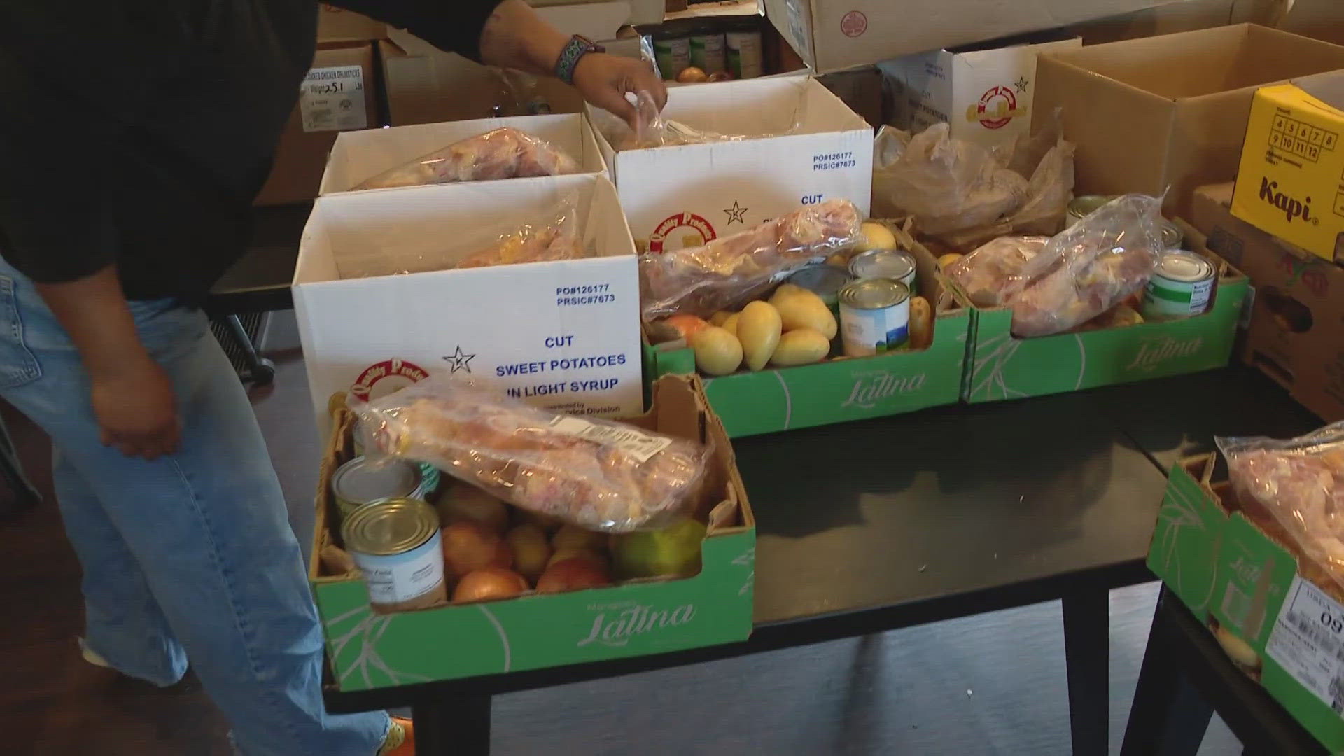 The Ross Foundation held its 11th annual "No Family Will Starve" holiday food giveaway.