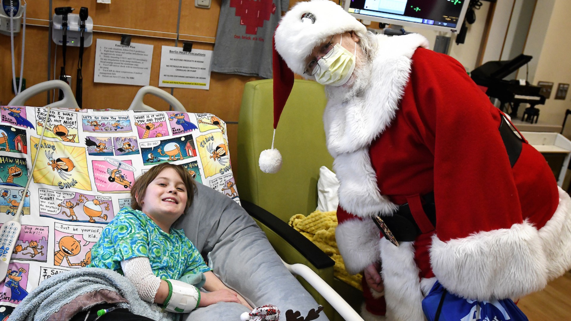 Santa was able to deliver gifts, pose for photos and talk with patients.
