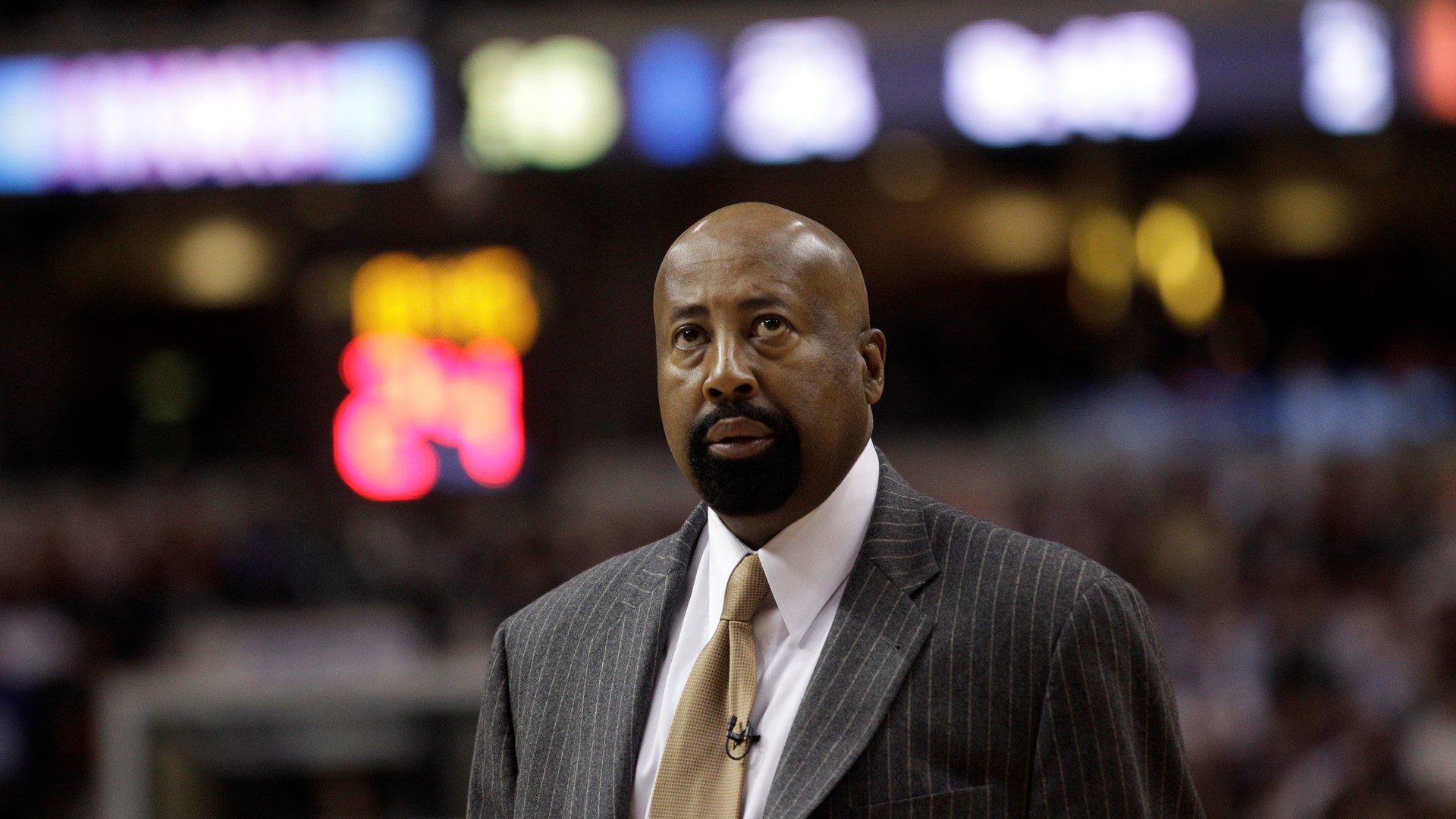 Sources say New York Knicks assistant Mike Woodson is expected to accept a deal to become the next head coach.