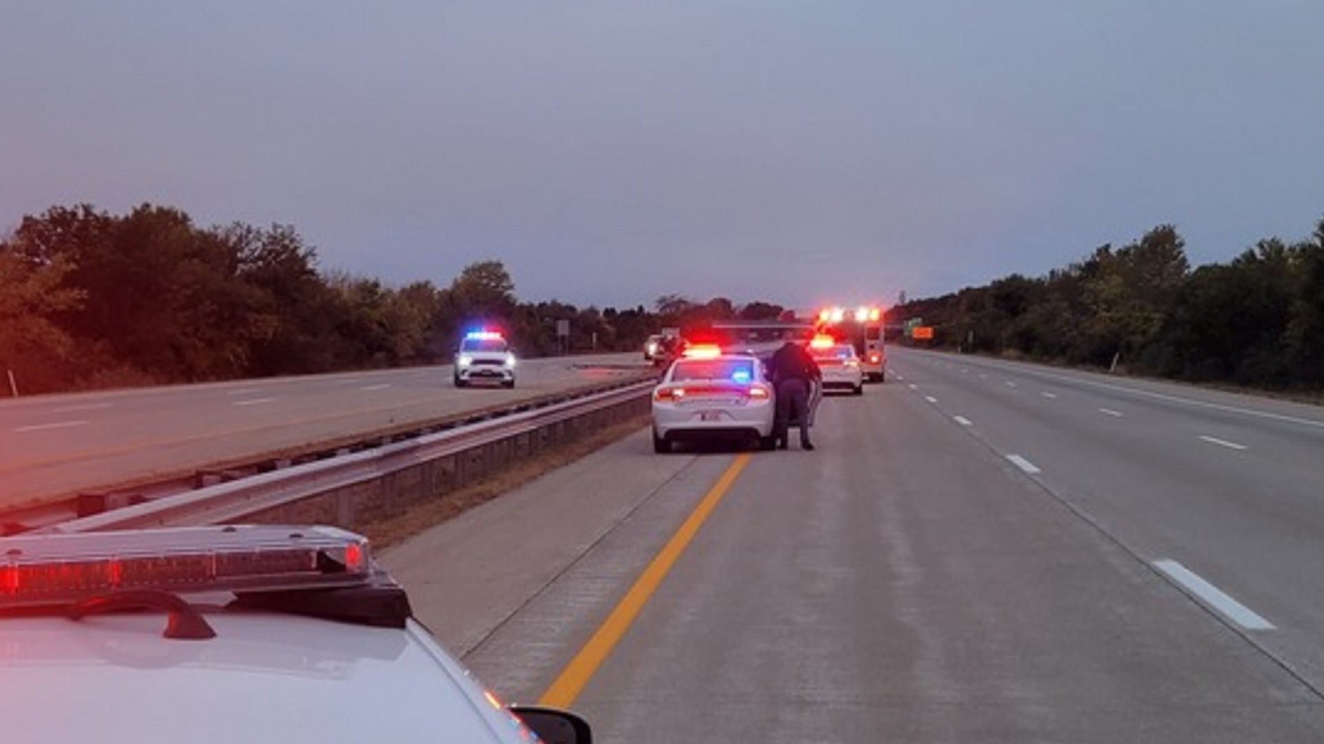 Police say the driver's Jeep swerved, broke through a guard rail, and then burst into flames. 
The passenger inside died.