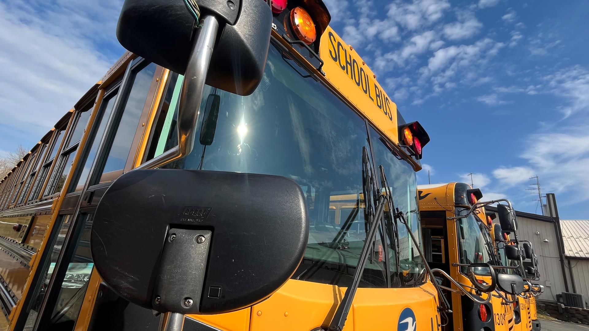 A man is under arrest, accused of impaired driving when he crashed into a school bus.