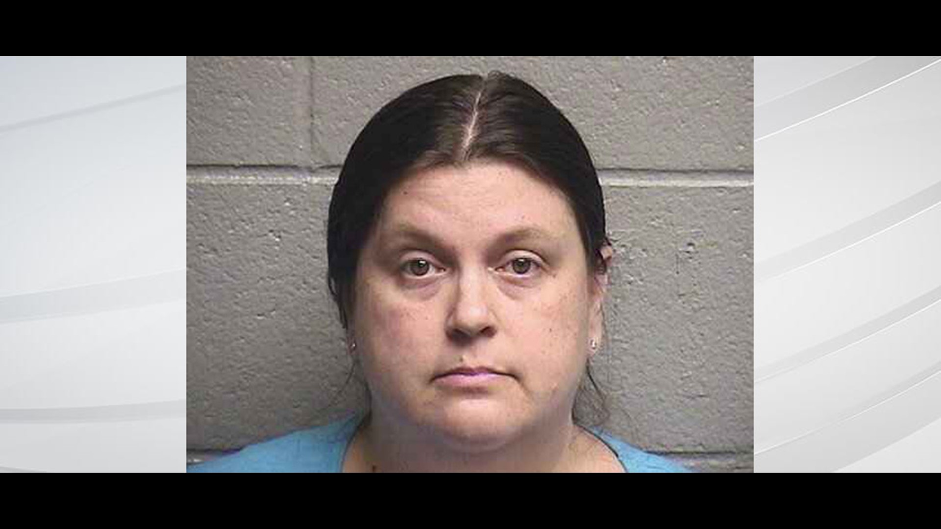 Teacher charged with threatening to 'shoot up' her school
