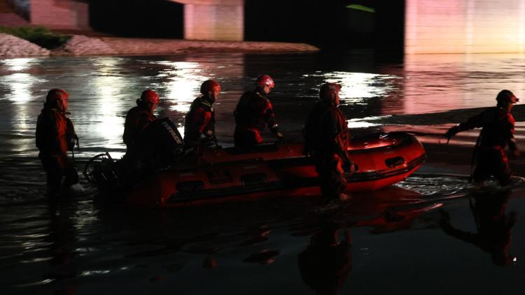 Woman rescued after clinging to tree for 2 hours after kayak flipped over in White River
