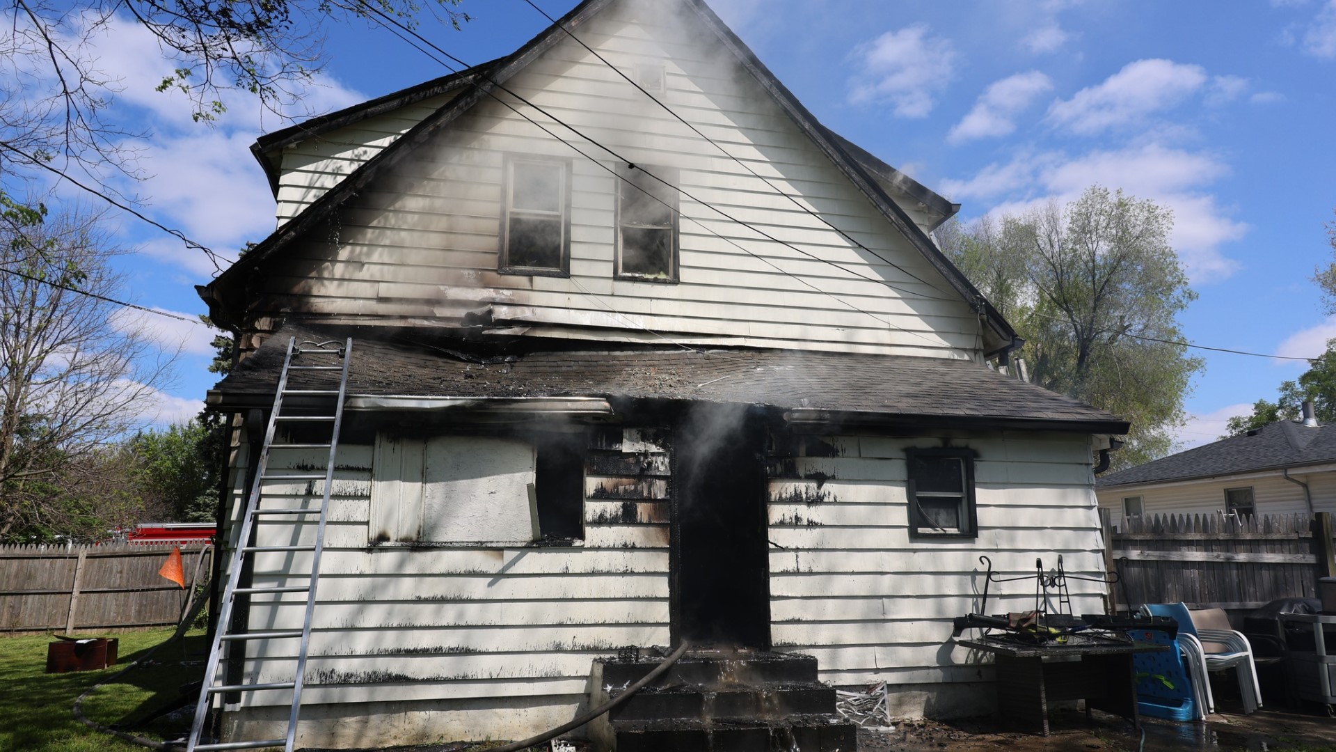 The fire was reported around noon Sunday in the 3600 block of West Michigan Street, near North Tibbs Avenue.