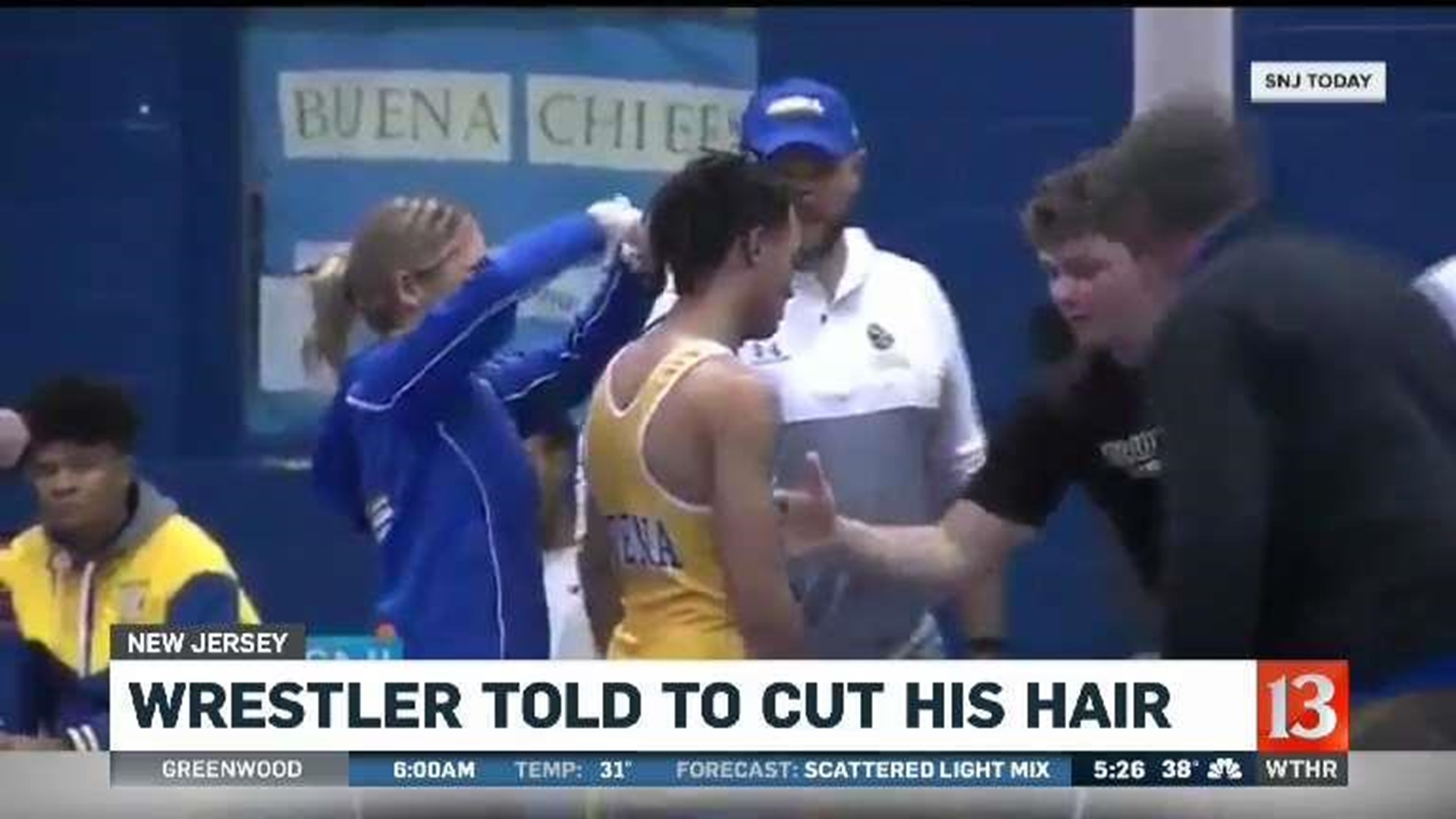 Wrestler told to cut his hair