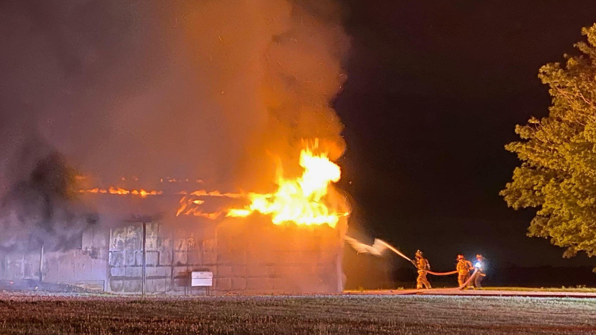 Firefighters extinguished a barn fire in Johnson County that investigators believe was caused by exploded fireworks being set out in the heat.