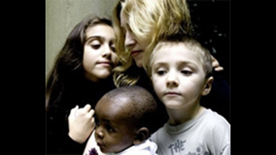 Madonna accepts monitoring over adoption