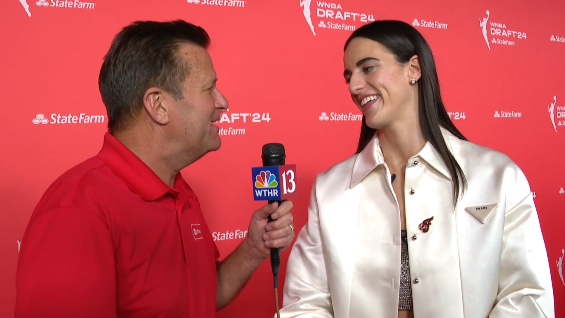 Dave Calabro interviews Indiana Fever No. 1 draft pick Caitlin Clark at the WNBA draft in Brooklyn, New York.