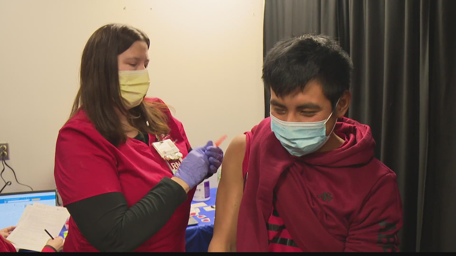 About 300 people received the COVID vaccine or booster shot and 90 others got their flu shot at the Riley Hospital clinic at the Children's Museum Thursday.