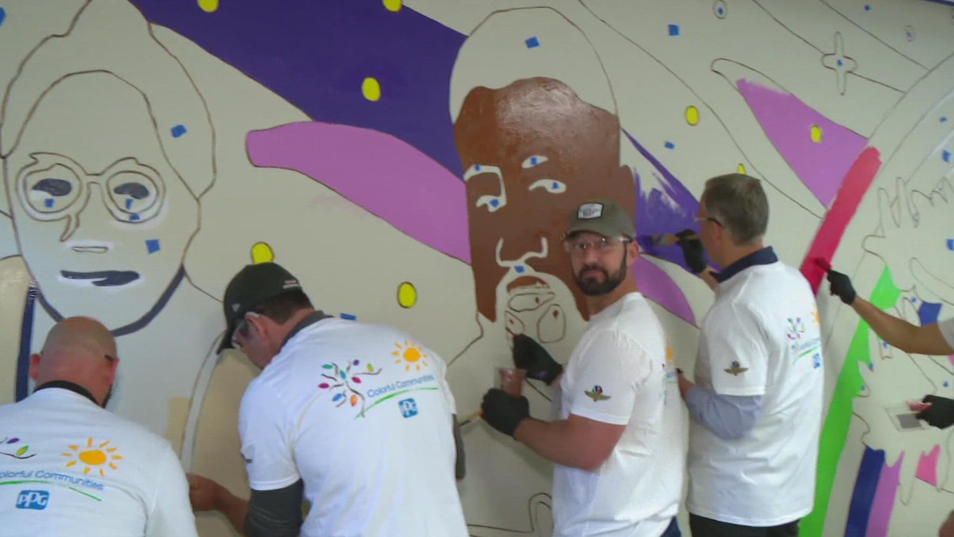 Drivers took a break from the grind of the season to help with a makeover at Hawthorne Community Center.