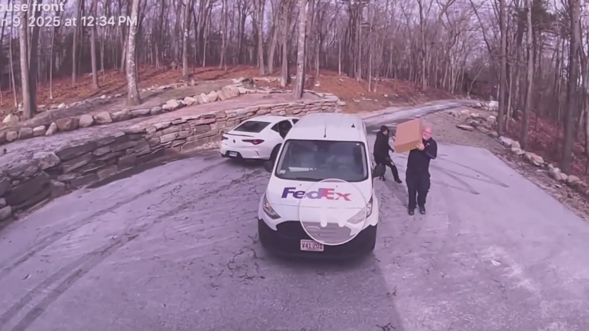 Caught on Camera | FedEx driver robbed while making delivery on Jan. 9 ...
