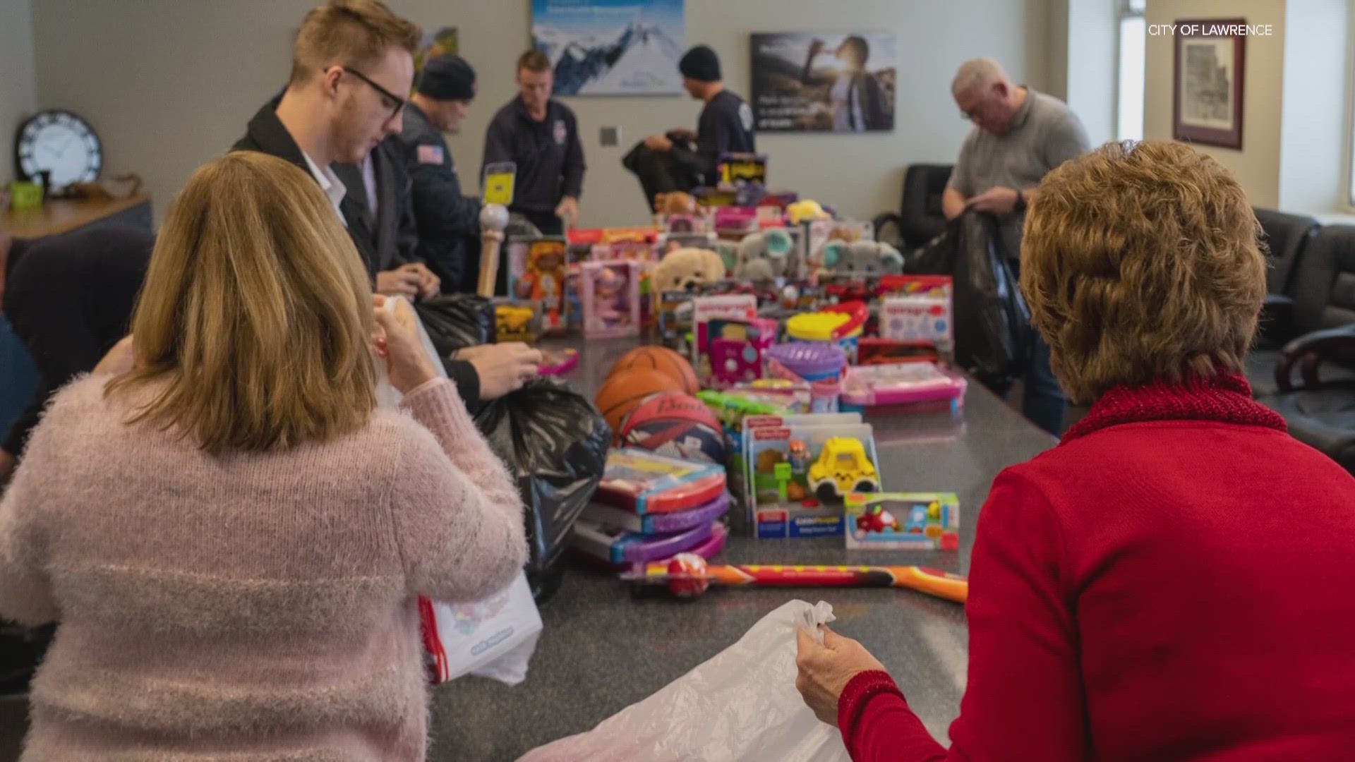 Hundreds of families in Lawrence will have the food they need for Christmas dinner along with new toys for the kids thanks to the Lawrence Fire Department.