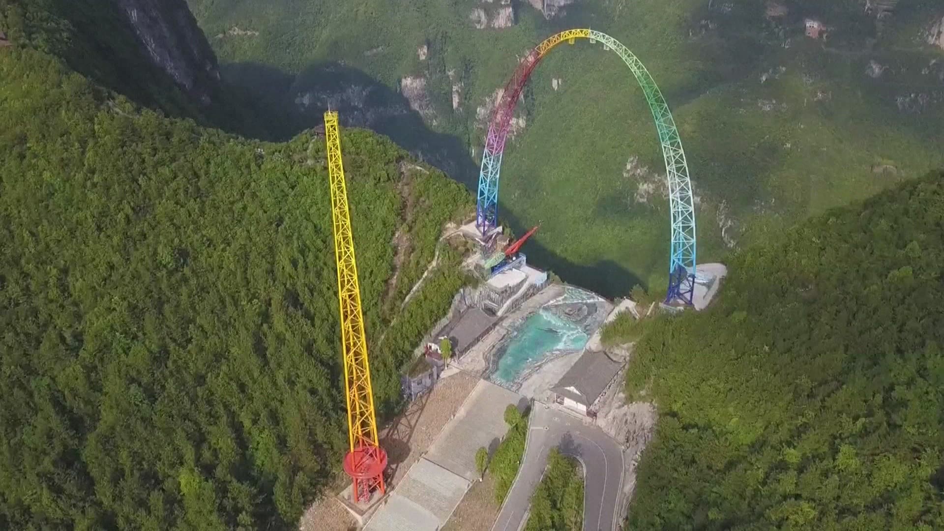 Riders drop nearly the length of a football field at 80 m.p.h as they swing over a cliff.