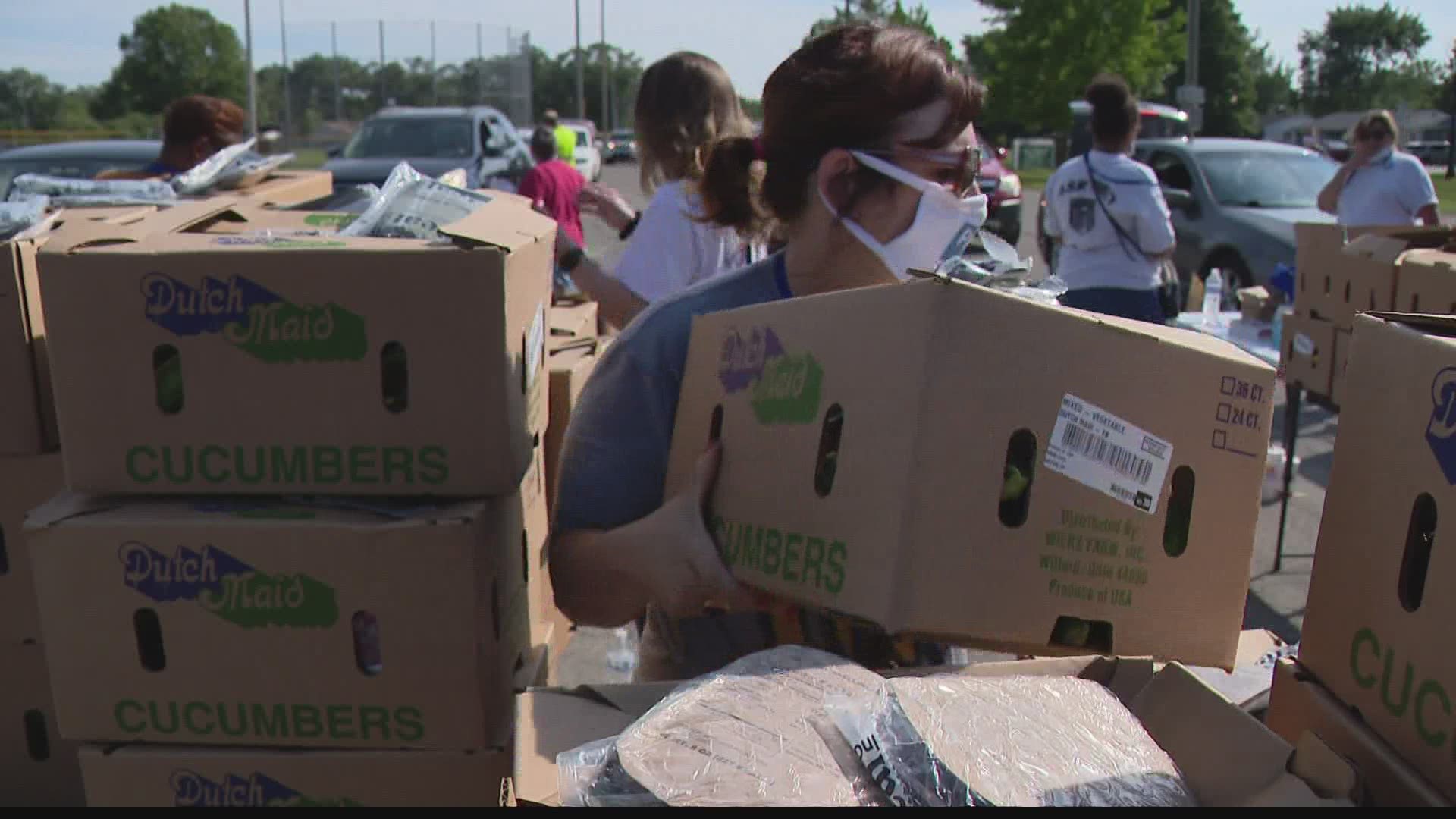The line started to form early at a mobile food bank Thursday.