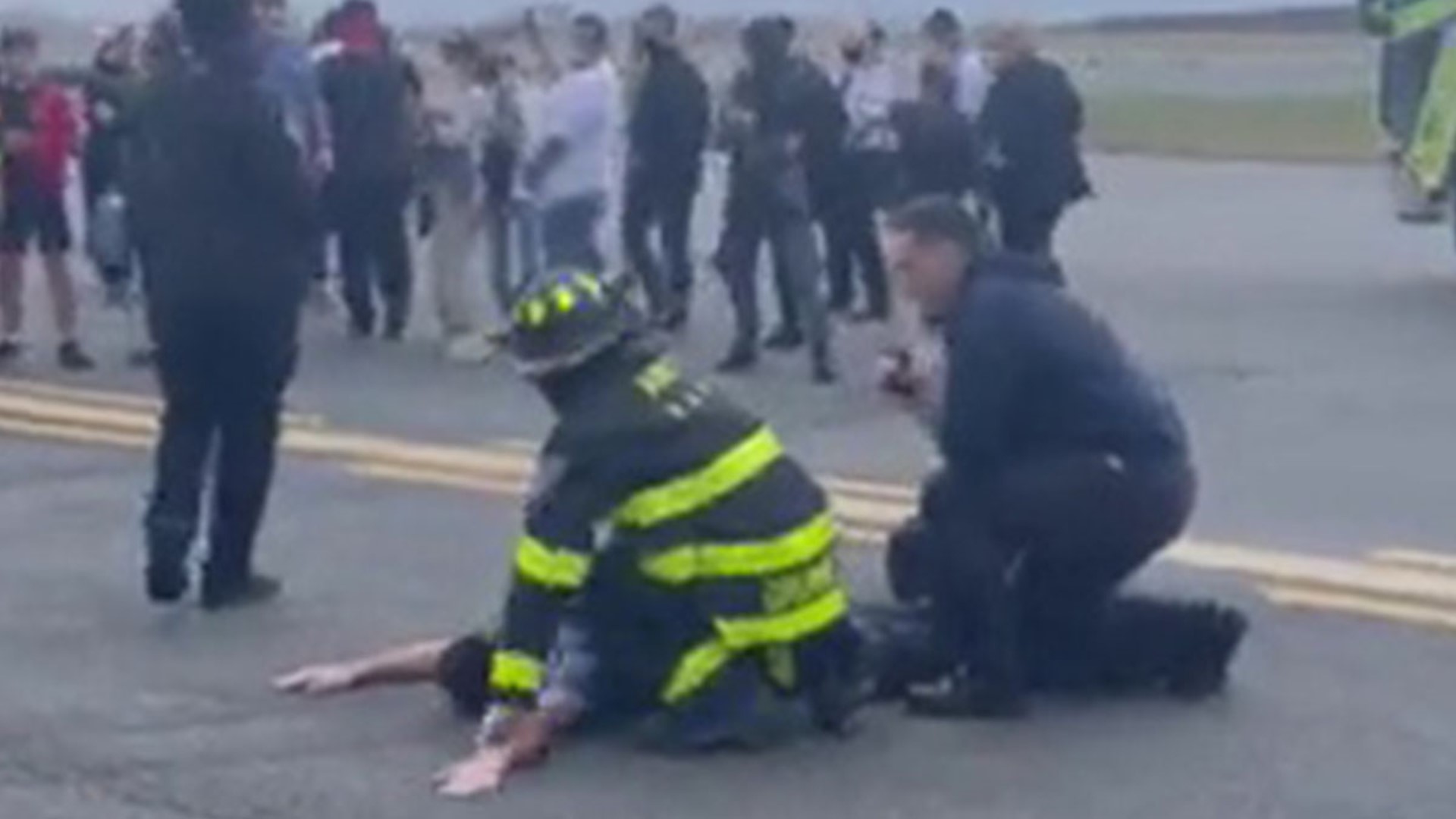 An airline passenger whose behavior aboard a flight prompted an emergency landing and evacuation at LaGuardia Airport has been released with no charges filed.