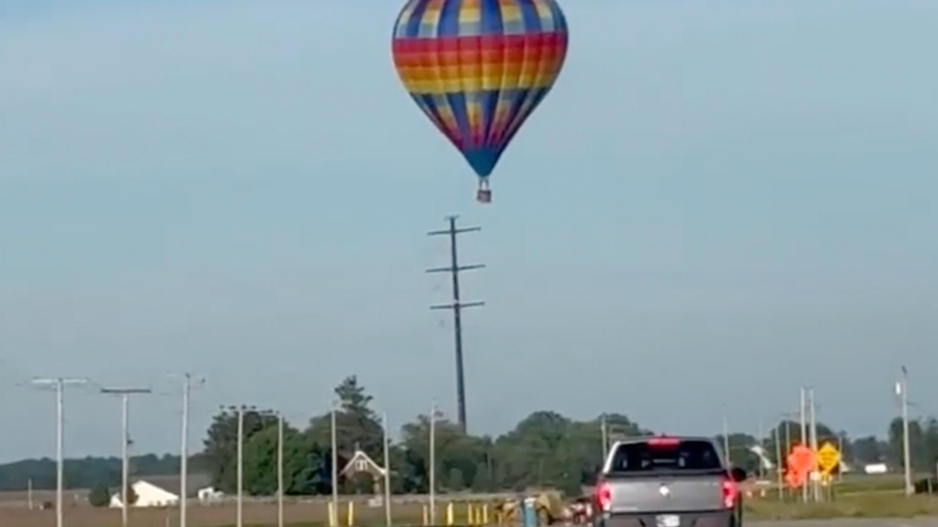 Federal investigators are probing a hot air balloon crash in northwestern Indiana that injured three people who were in the balloon’s basket, which had caught fire.