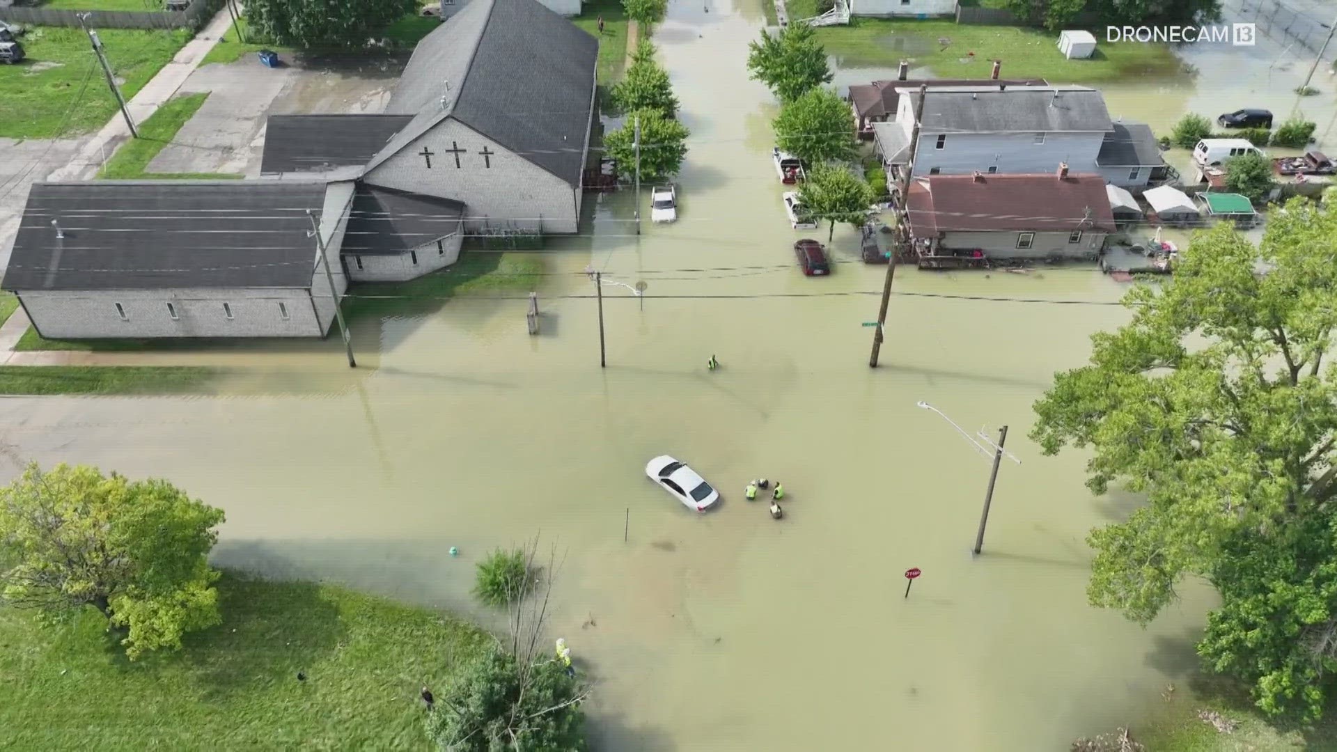 Workers are trying to fix a water main break after it flooded a 2-block area in Indianapolis.
