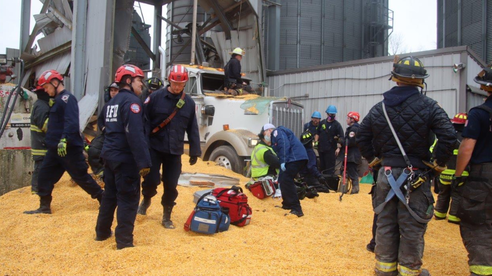 The man had pulled his truck up under the silo to load up with the corn and stepped out when it collapsed.