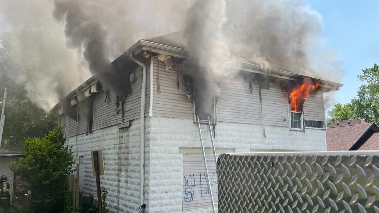 Firefighter injured, man displaced after house fire on Indianapolis’ near west side