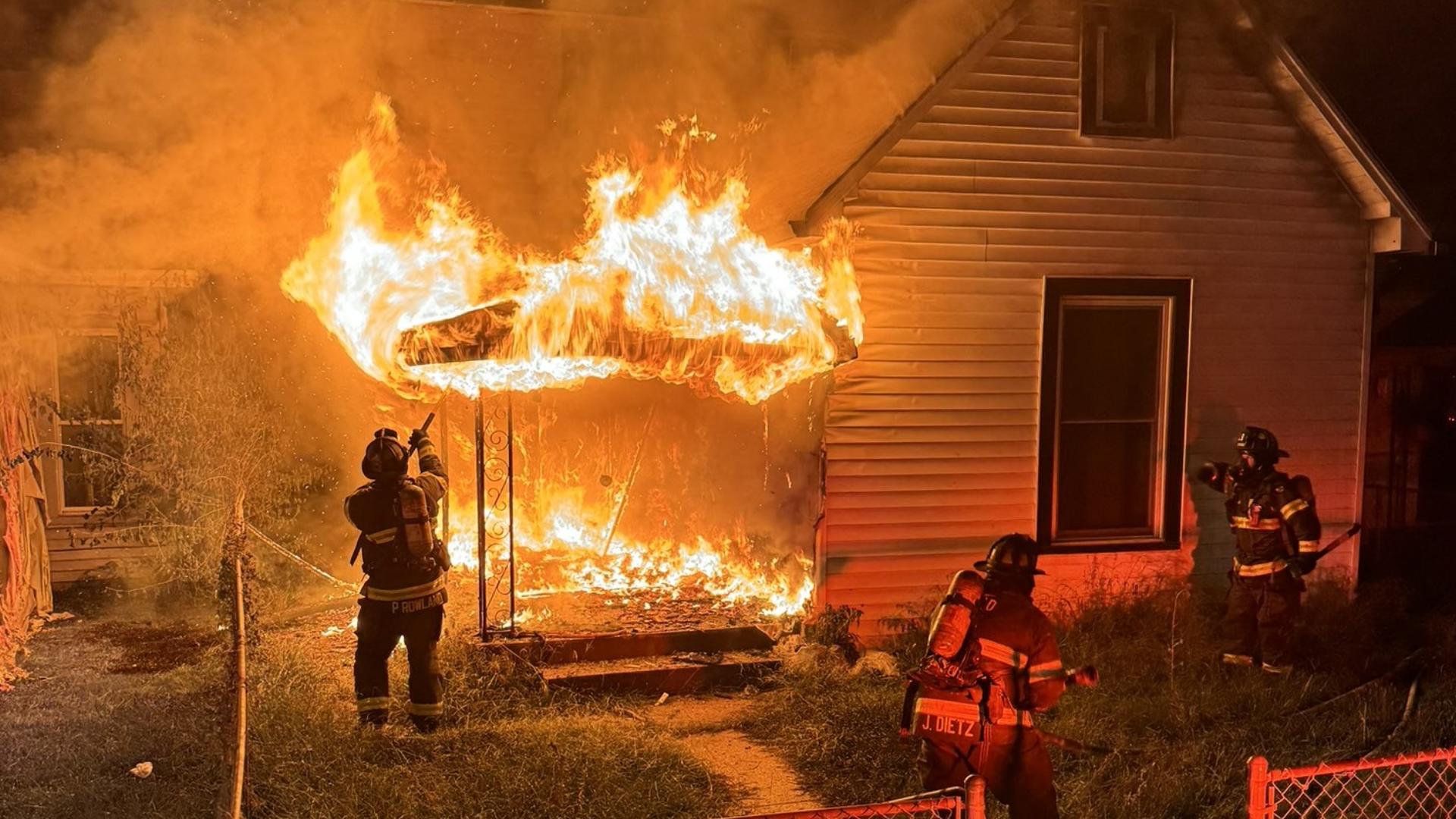 The fire broke out on the porch of a house near Belmont Avenue and Morris Street just after 1 a.m. Sunday.