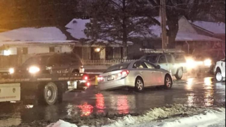 Woman wrecks into sinkhole after water main break on Indy’s east side