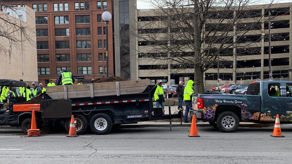Volunteers spread mulch to beautify downtown Indy