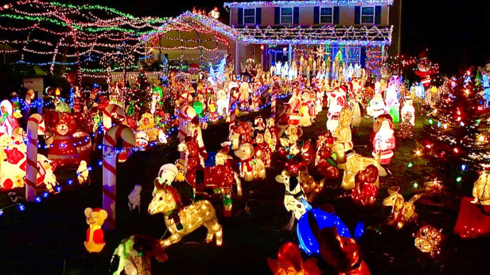 Each year, the Elstons make a commitment to brighten the moods in their Muncie neighborhood with their holiday lights display.