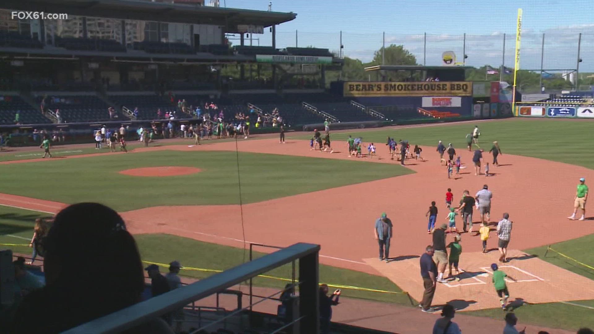 Connecticut families headed to Dunkin' Donuts Park Sunday for a Father's Day baseball game. Dads say it means "the world" to celebrate with their kids.
