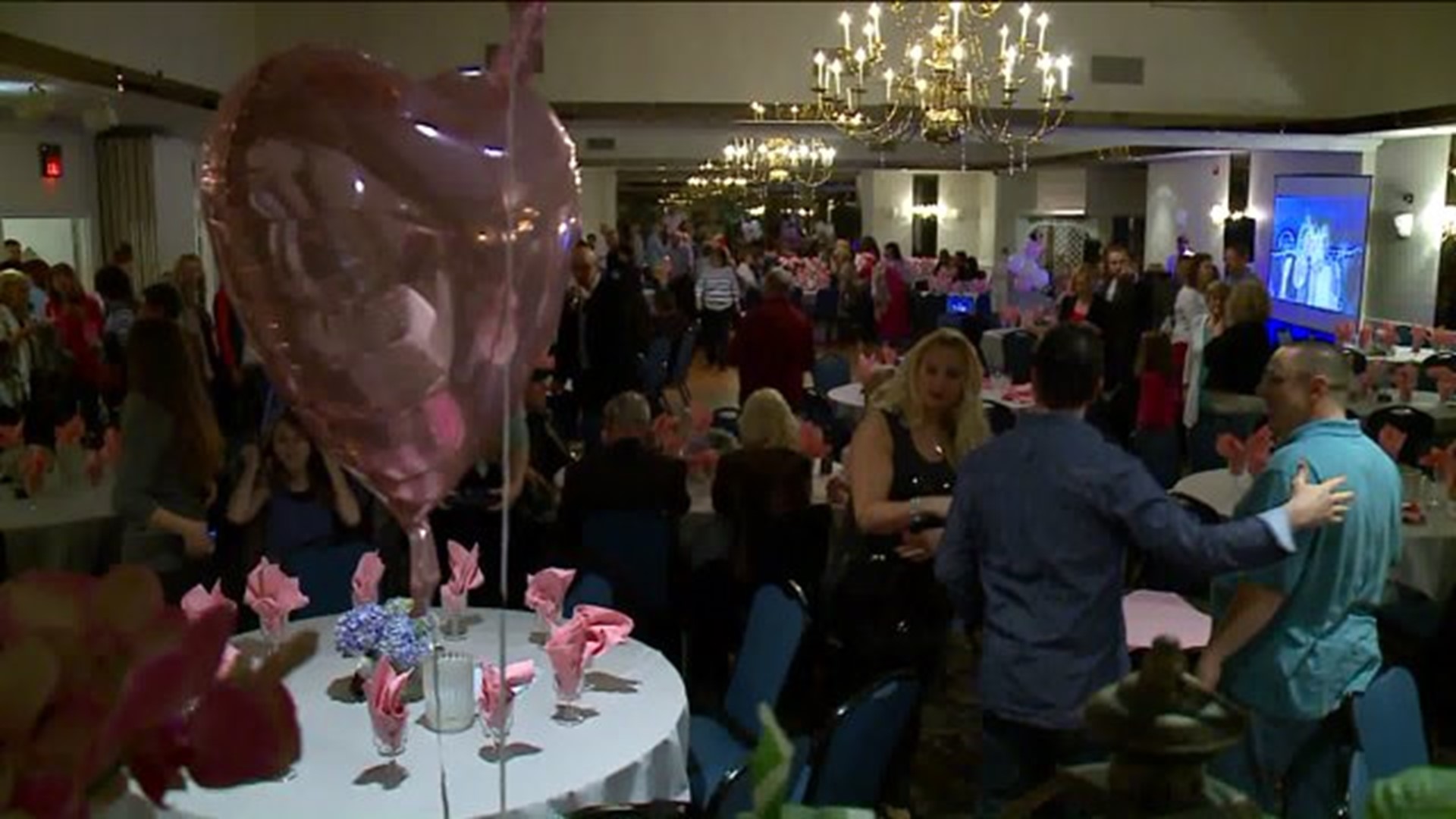 Woman honored at breast cancer event
